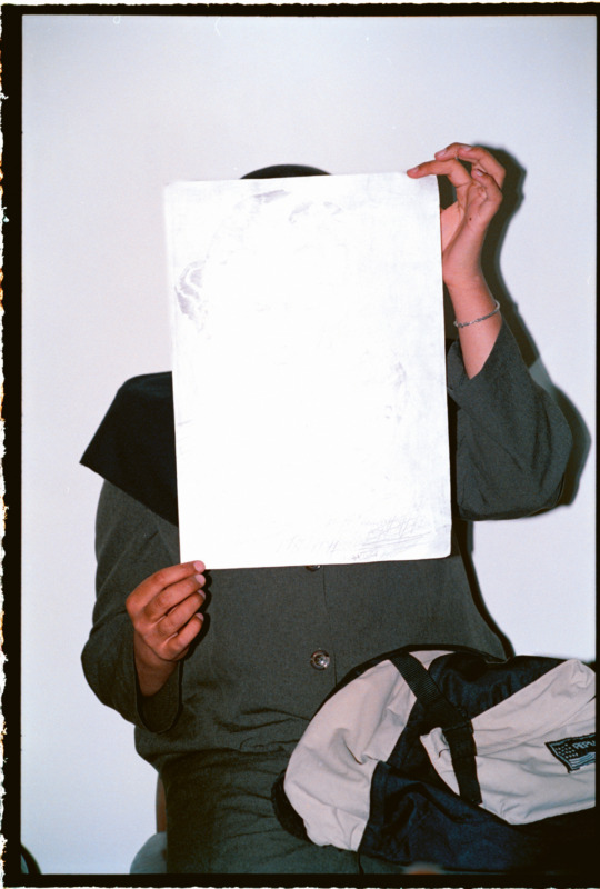 A girl hiding her face, in a special shelter for vulnerable women.(Tehran, 1998) © Newsha Tavakolian